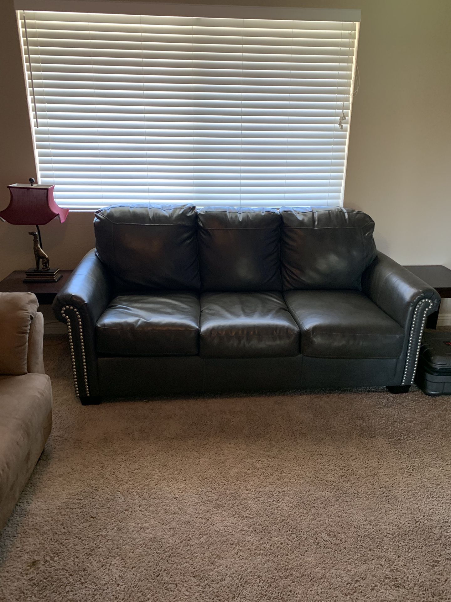 Fold out leather couch/bed