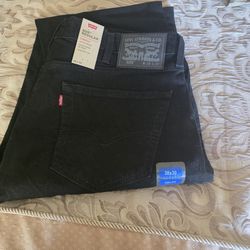 Levi 505 regular fit black stretch jeans, 38x30. New with tags.