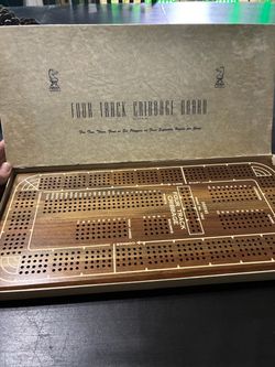 Four track wooden cribbage board