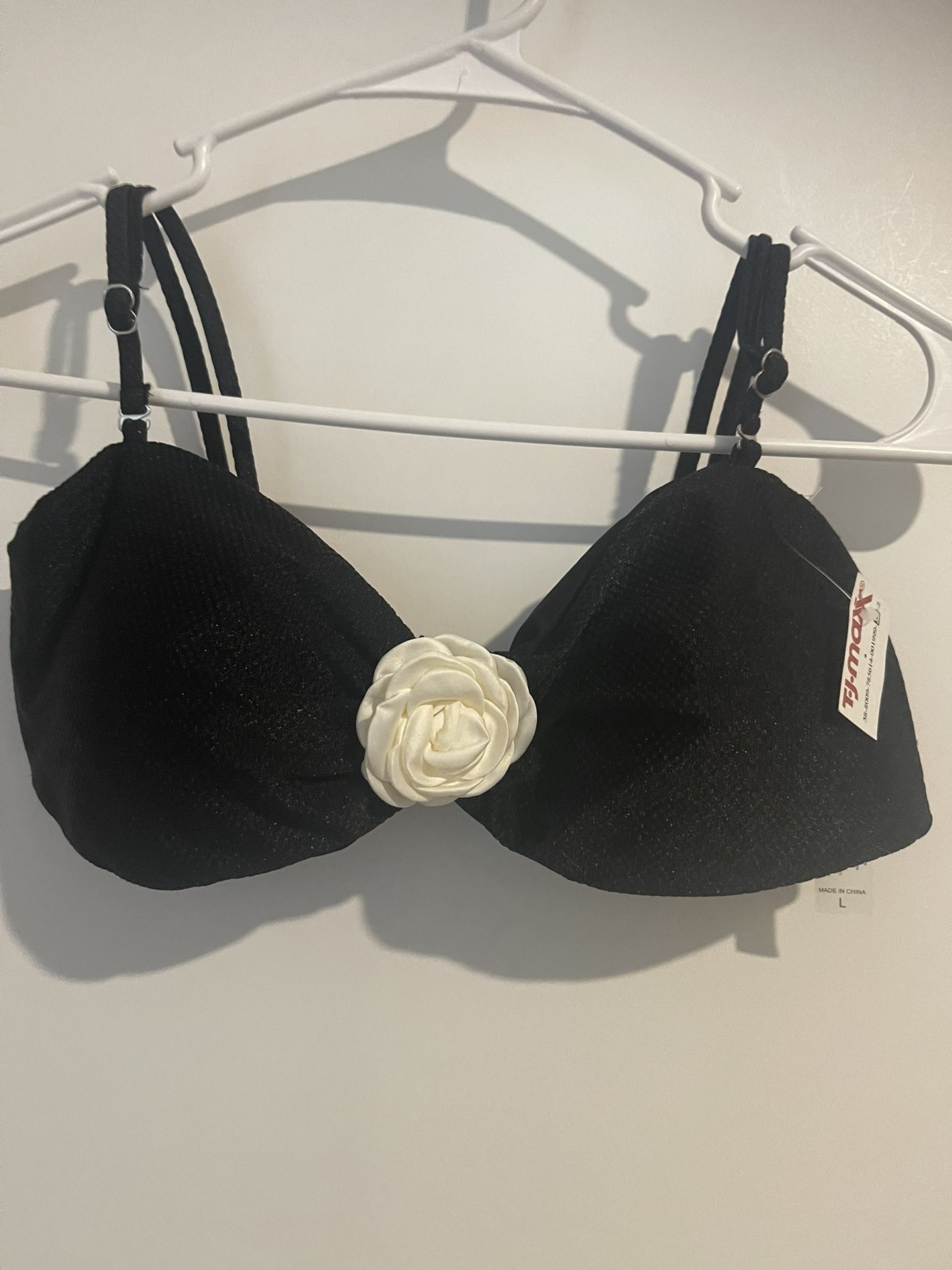 NWT TiniBikini Size L Black Bikini Top With White Flower Accent