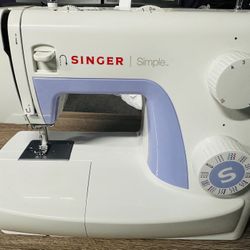 Sewing Machine: Singer 3221/3232