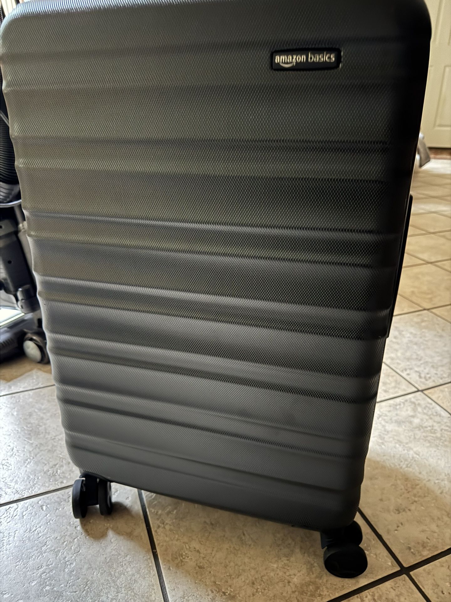 Used Once And Looks Brand New Hardshell, Medium Size Luggage With Four Smooth Wheels