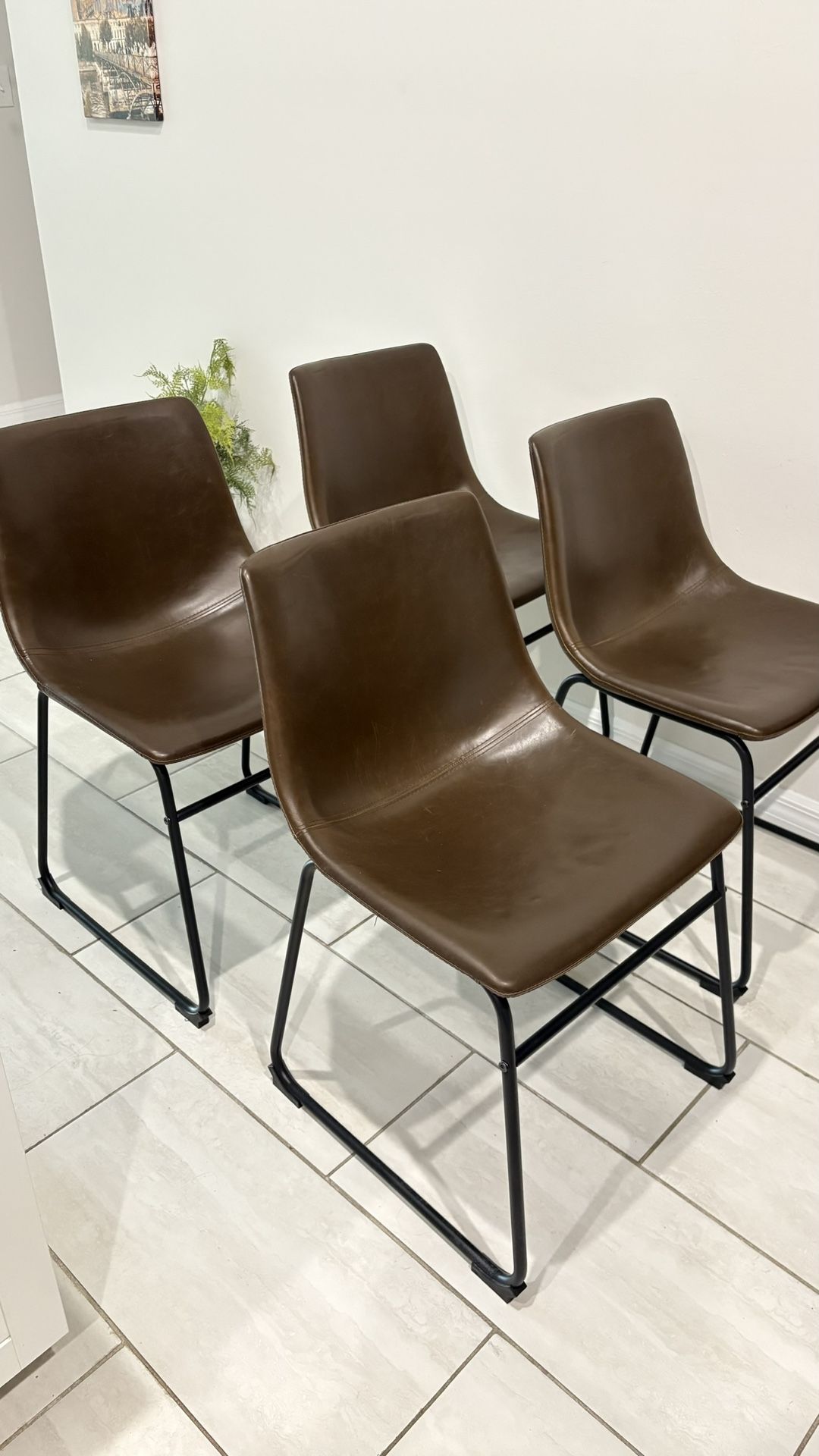 4 semi-new leather dining table chairs 