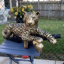 Leopard On The Log Statue