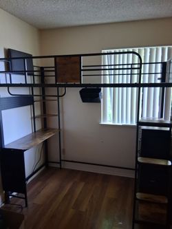Loft bed w/ built in  desk, dresser, & latter