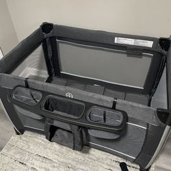 Pack n Play with diaper compartment.