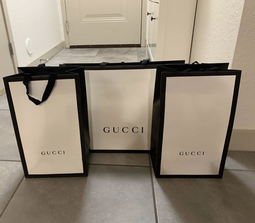 Gucci gift bag(s)