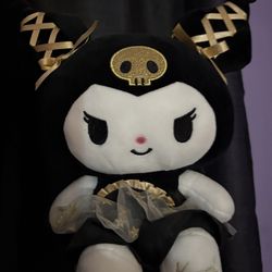 Cute Plushy With Black And Gold Outfit 