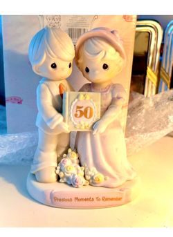 beautiful Precious Moments figurine. Depicting a lovely couple celebrating 50 years of love a