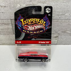 Hot Wheels Larry’s Garage Red / Black ‘1967 Pontiac / with Signature underneath • Die Cast Metal • Made in Malaysia   Metal Body  / Real Riders Tires