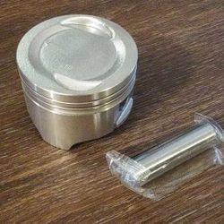 Suzuki piston heads with pins