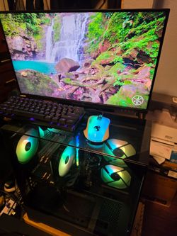 Gaming PC with keyboard, mouse, and monitor