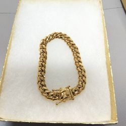 14k gold-plated Cuban Link 8mm bracelet...