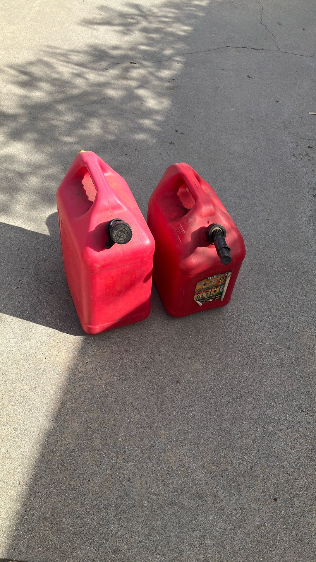 2 Plastic Gas Cans. 5 Gal Ans 6 Gal 