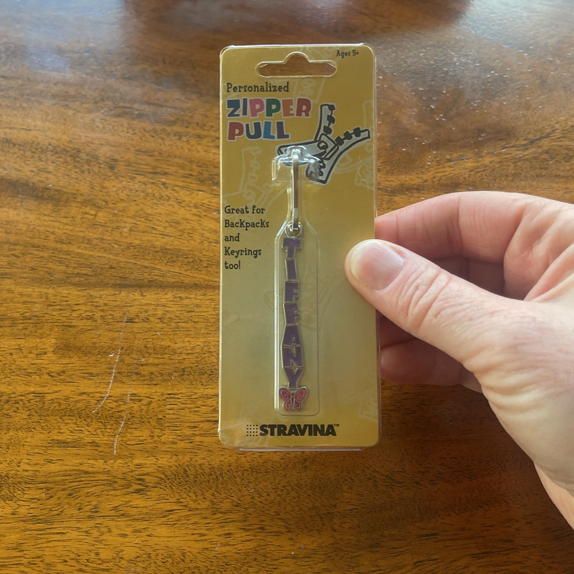 Unopened Stravina Zipper Pull
