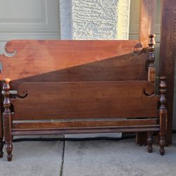 Vintage twin Sold wood bed frame cherry.