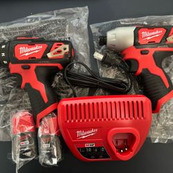 Milwaukee M12 Drill And Impact Driver 2 Batteries And Charger 