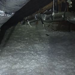 Blowin Attic Insulation Soplada