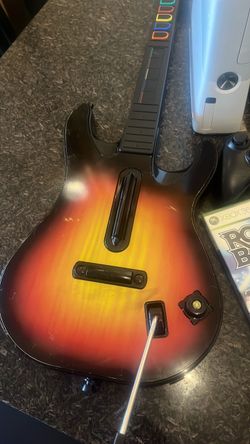 Xbox 360 slim 4  and Rock Band Guitar Controller