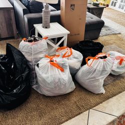 Seven bags of women in men’s clothing $75 