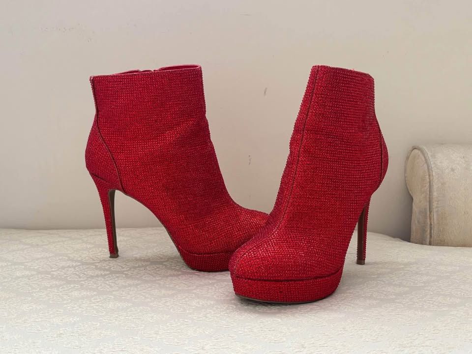 Ruby red high heeled boots