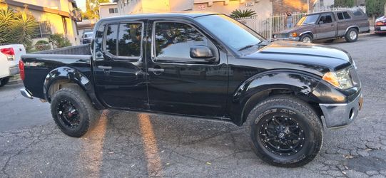 2010 NISSAN FRONTIER....TITULO LIMPIO