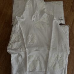 White monochrome denim tear 