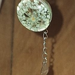 1 SILVER NECKLACE WITH TRANPARENT FLOWER ORB SET IN SILVER AND 1 CUBAN CHAIN