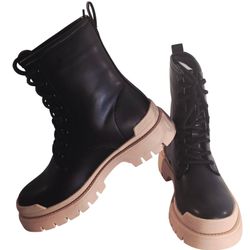 Fashion Nova  the "Night Is Young Combat Booties" from Fashion Nova. 