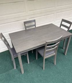 5-PC GRAY FINISH DINING SET (DINING TABLE AND AND 4 PADDED CHAIRS)