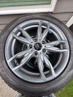 BMW M sport Potenza tires and powder coated rims.