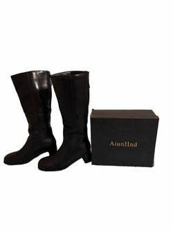 Woman’s knee high zipper boot