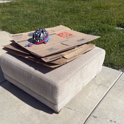 Free Ottoman, Moving Boxes And Childs Helmet