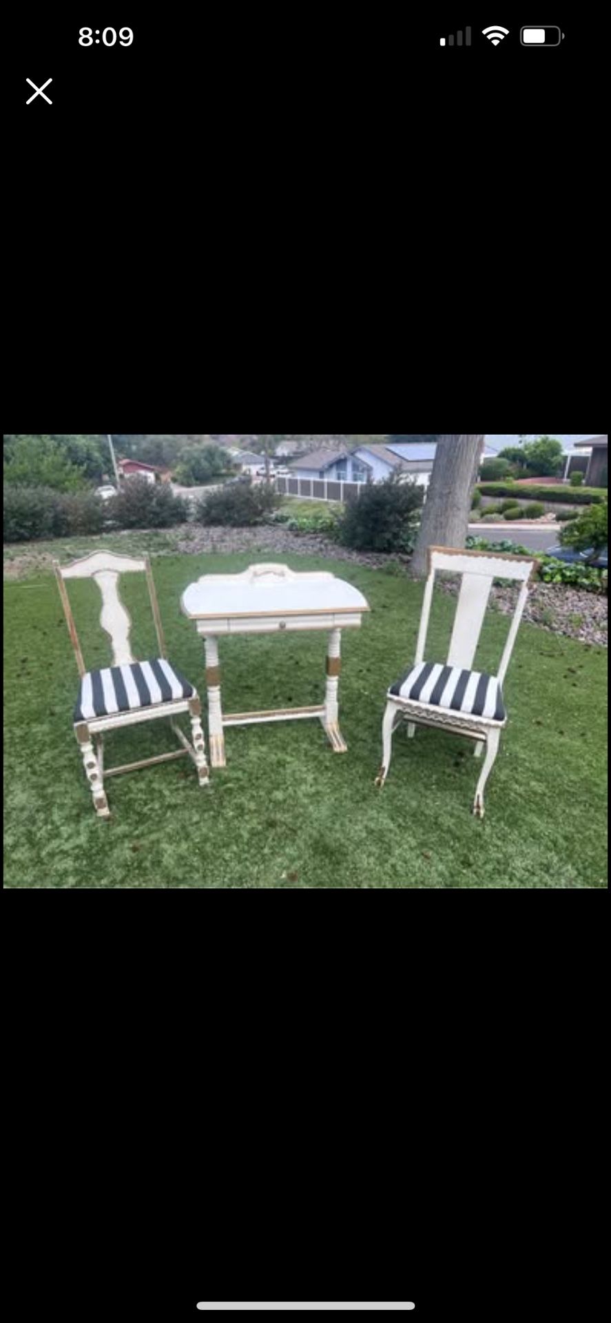 Timeworn vintage petite French desk with chair plus a companions chair.