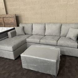 New Grey Sectional And Ottoman 