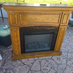 Electric Fireplace with Wood Mantel