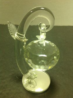 Crystal clear Statue hanging apple