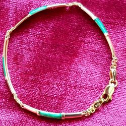 14K YELLOW GOLD BRACELET WITH ENAMEL GRIN TRIM 7 INCHES LONG