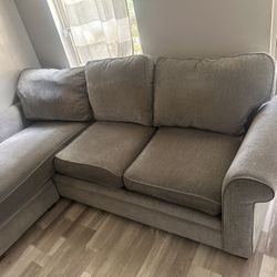 Sectional sofa with removable ottoman 