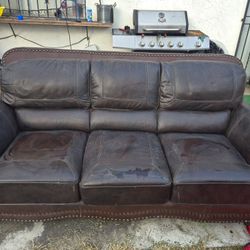 Brown leather Couch need a good wipe off