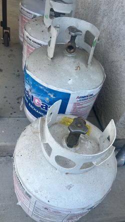 empty and full propane tanks