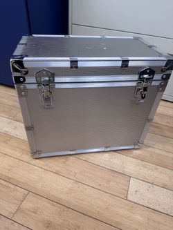aluminum storage case, often used for transporting tools or equipment.