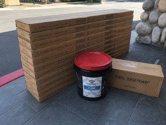 17 Boxes Luxury Vinyl Flooring + 2 Glue Buckets + 2 Vinyl Baseboards - $450
