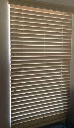 Used Single hung vinyl window with blind
