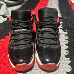 Jordan 11 Low Breads 