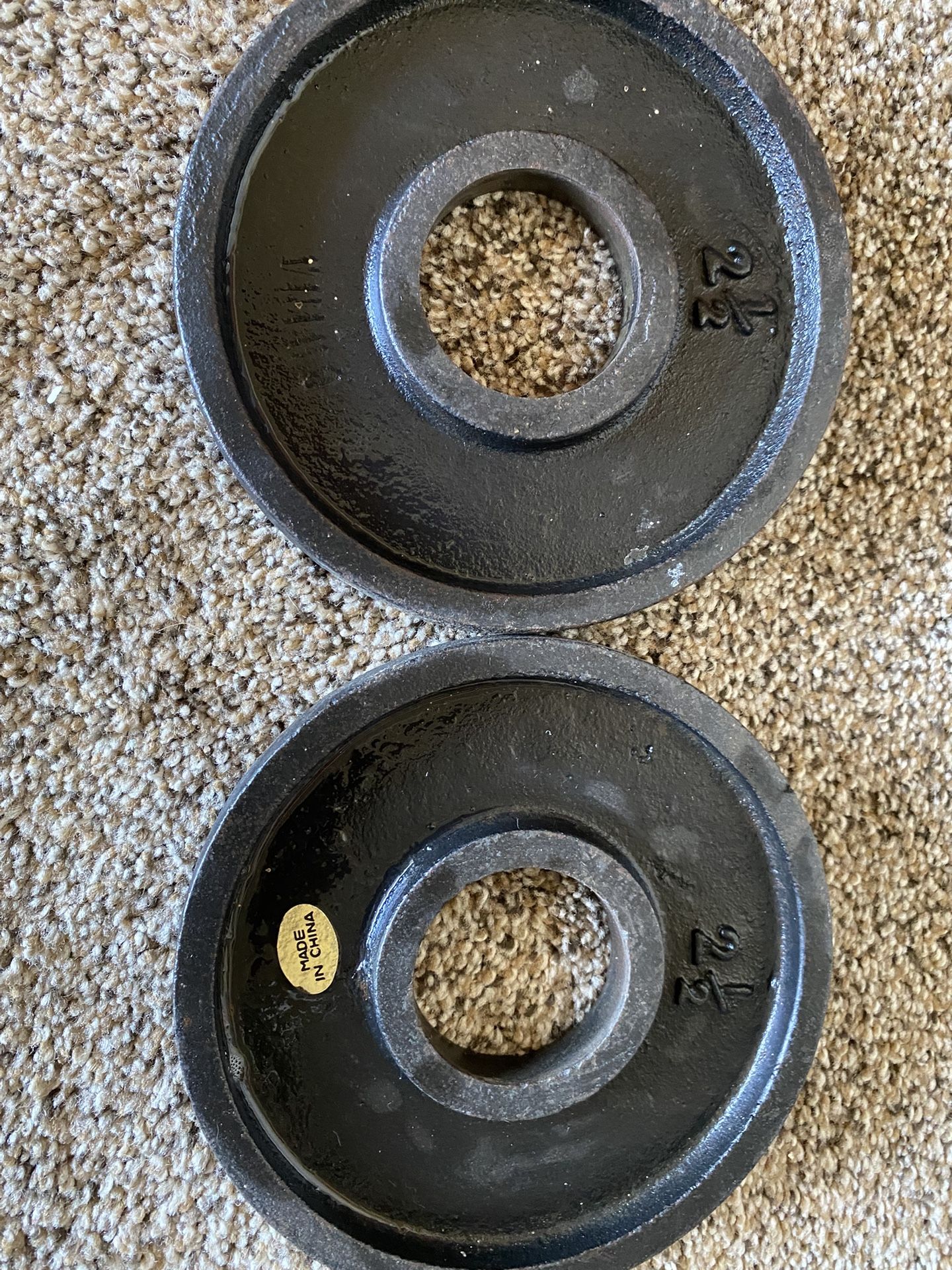 2- 2 1/2lb. Cast Iron Olympic Weights