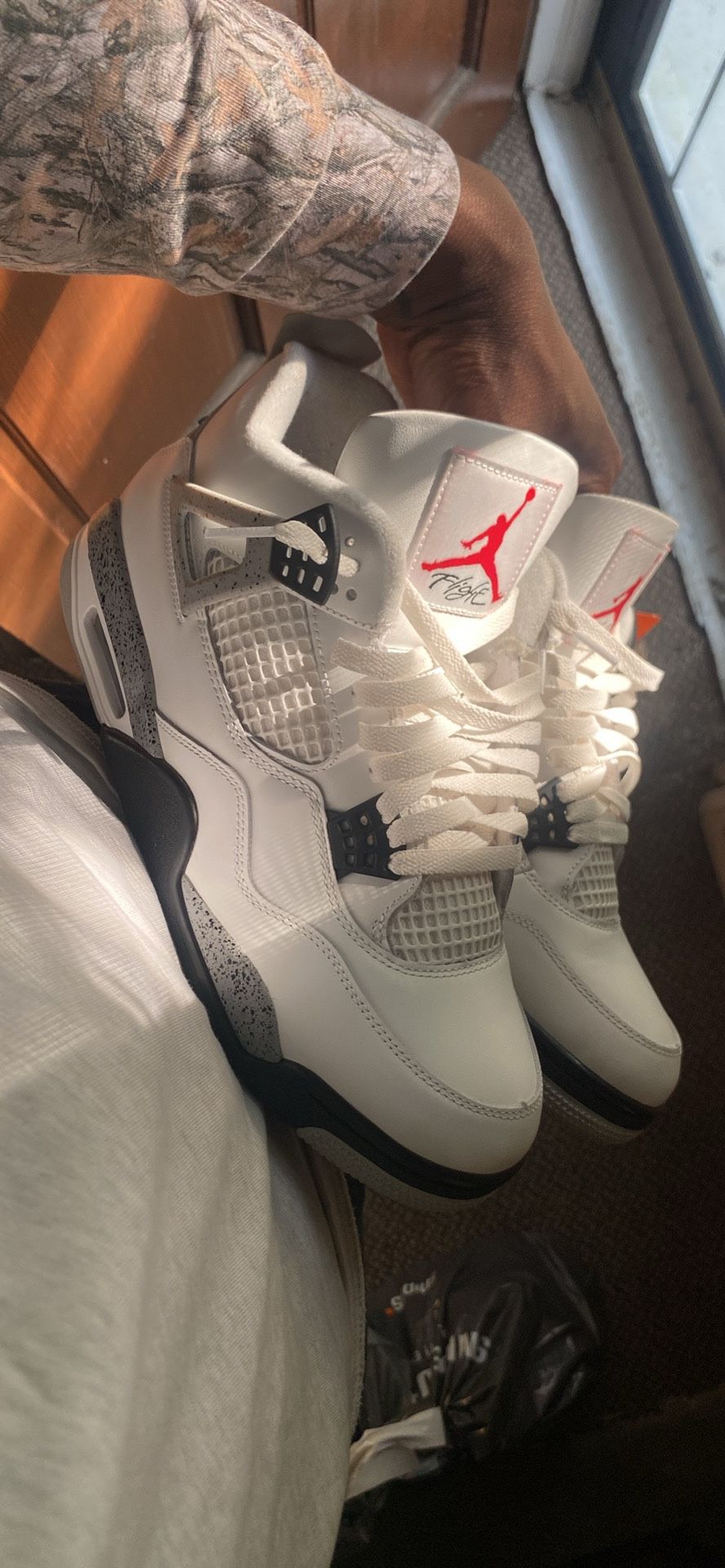 Jordan 4 White Cement