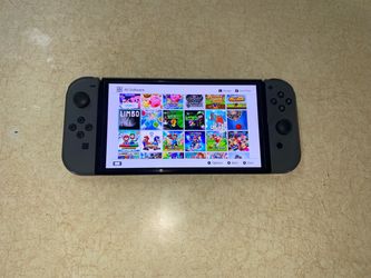 Nintendo Switch OLED with 125 Switch Games