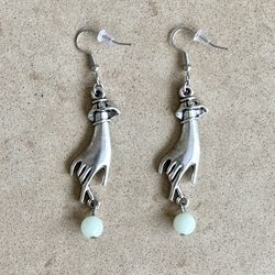 🍏 Beautiful & artistic silver tone hand charm earrings with light green bead charm