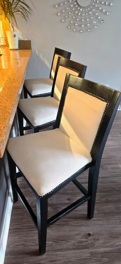 Three bar stools